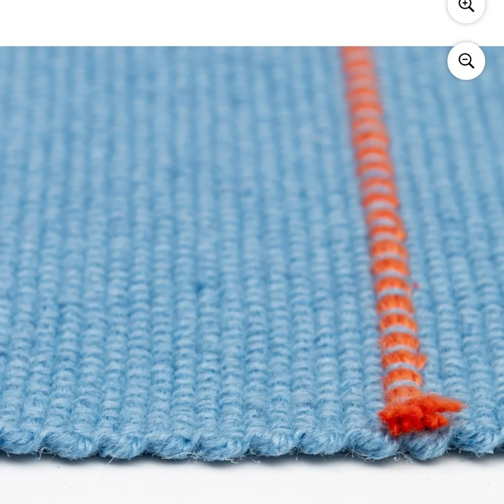 Blue and Orange Striped Fringe Rug